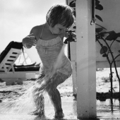 Beach girl washing off, Florida