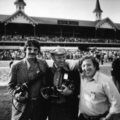 Cooke with photographers Szabo & Leifer at Kentucky Derby, 1973