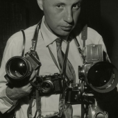 Jerry Cooke self portrait with several cameras, 1960s
