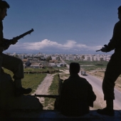 Fighters on building ledge, 1948
